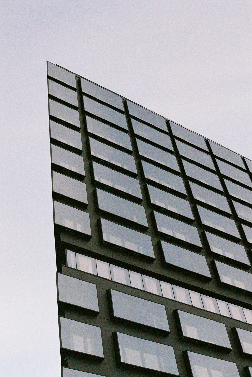 Modern office building in flat lighting. Shot on Fujifilm Superia X-tra 400.